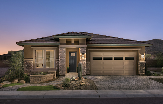 A one-story new home with views of the surrounding Phoenix, AZ, nature.